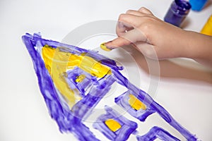 Children Hands doing Fingerpainting