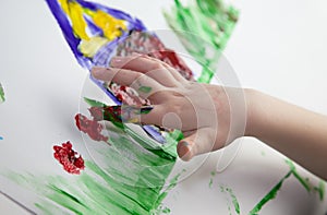 Children Hands doing Fingerpainting