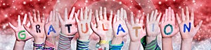 Children Hands Gratulation Means Congratulations, Red Christmas Background