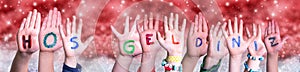 Children Hands Hos Geldiniz Means Welcome, Red Christmas Background