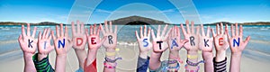 Children Hands, Kinder Staerken Means Strengthen Children, Ocean Background