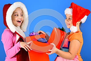 Children with happy faces give presents on blue background.