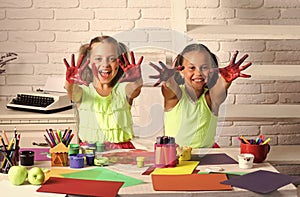 Children happy smiling with colored hands