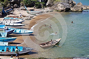 Children at the harbour of Boca de Yuma