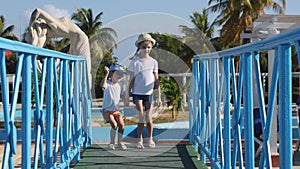 Children have fun on vacation at the hotel.Brother and sister are jumping