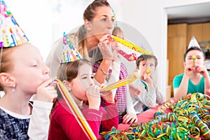 Children having birthday party with fun