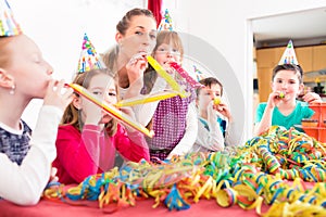 Children having birthday party with fun