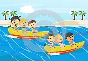 Children Having Fun On Banana Boat