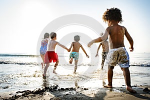 Children having fun on the beach