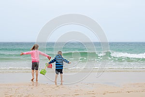 Children having fun on the beach