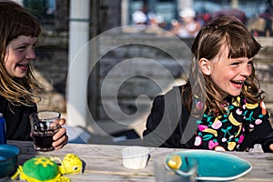 Children having fun in a beach cafe