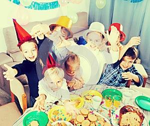 Children having fun during friendâ€™s birthday party