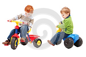 Children having fun riding on kids bikes