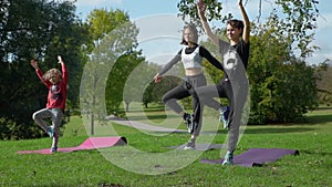 Children Having Yoga Class in the City Park