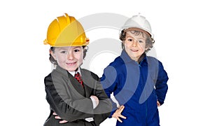 Children with helmet like a engineer and a construction worker