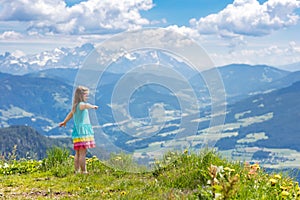 Children hiking in Alps mountains. Kids outdoor.