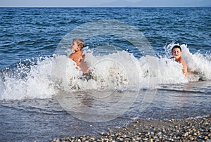 Children hit by wave