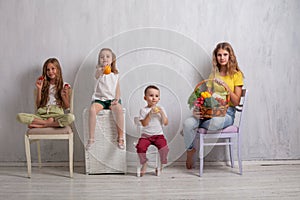 Children holding a basket of fresh fruit and vegetables healthy food