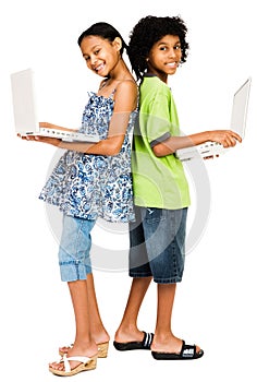 Children holding laptops and smiling