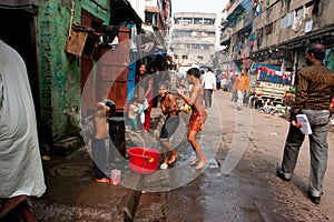 Children jump on the street at the bathe time