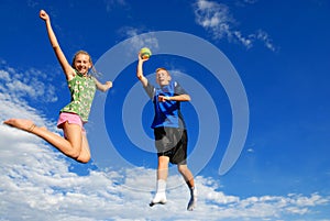 Children jumping high