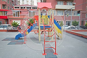 Children kids playground with play equipment outdoor. Kids playground with slides in the park . play ground red and white big