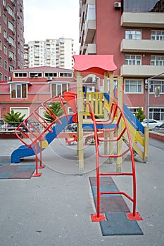 Children kids playground with play equipment outdoor. Kids playground with slides in the park . play ground red and white big