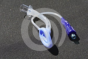 Children Laryngeal mask airway for emergency medical help on a black background.