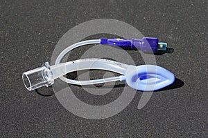 Children Laryngeal mask airway for emergency medical help on a black background