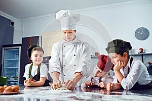 Children learn to cook in the classroom in the kitchen