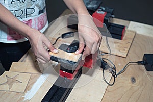 Children learn to make custom objects in fablab classes.
