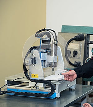 Children learn to make custom objects in fablab classes.