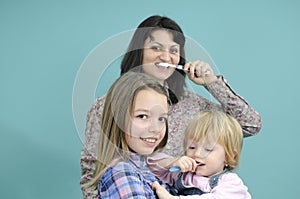 Children learning brushing teeth