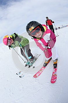 Children learning how to ski