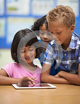 Children, learning and tablet in classroom for online education, scroll on school website and information in group