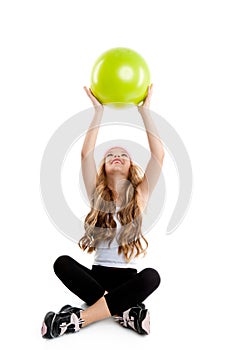 Children little gym girl with green yoga ball