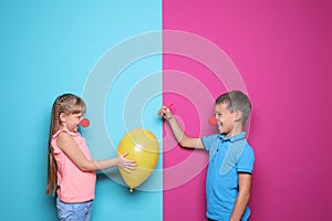 Children making balloon explosion joke