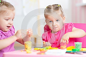 Children making by hands