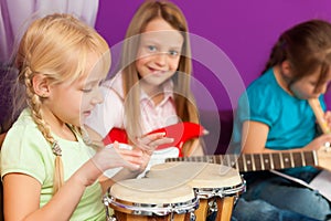 Children making music