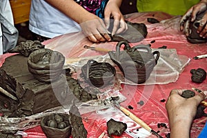 Children molding clay 1