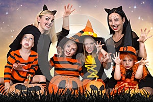 Children with moms celebrating Halloween.