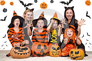 Children with moms celebrating Halloween.