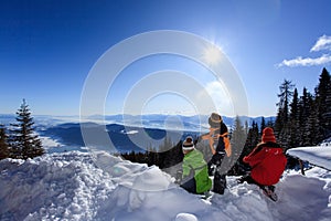 Children in mountain snow