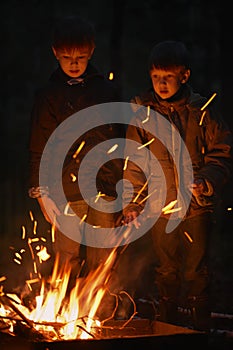 Children are near the fire