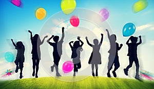 Children Outdoors Playing Balloons Togetherness Concept