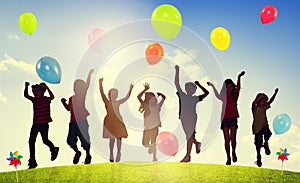 Children Outdoors Playing Balloons Togetherness Concept