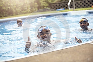 Children in outside swimming pool