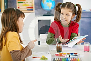 Children painting in art class