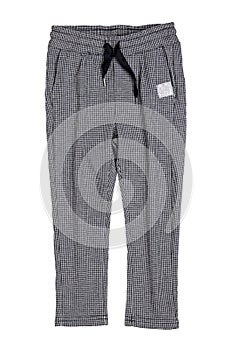 Children pants isolated. Close-up of a elegant gray white checkered trouser or sweatpants for child boy isolated on a white