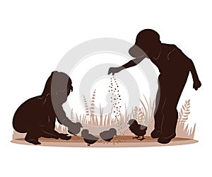 Children and pets silhouettes. Little boy and girl feeding chickens.